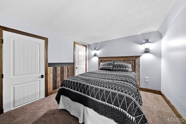 425 Cedar Ln, Wentzville, MO 63385 - carpeted bedroom featuring a textured ceiling and baseboards