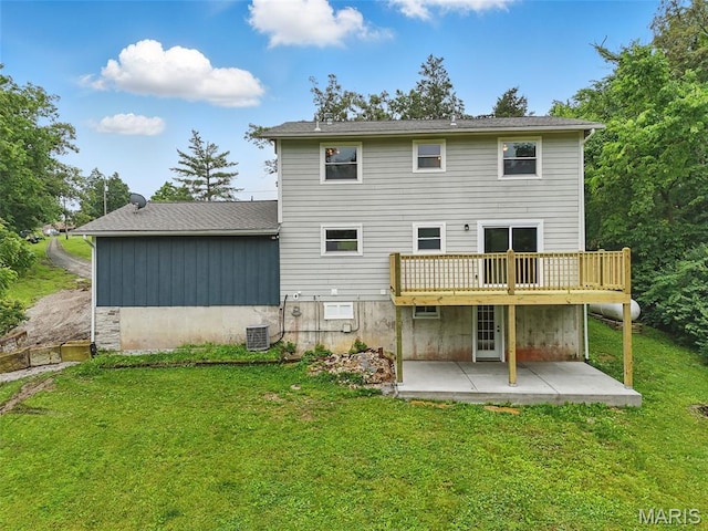 425 Cedar Ln, Wentzville, MO 63385 - back of house featuring a patio, a lawn, a deck, and central air condition unit