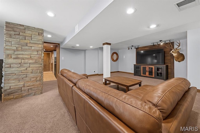 425 Cedar Ln, Wentzville, MO 63385 - carpeted living room with recessed lighting, track lighting, and baseboards