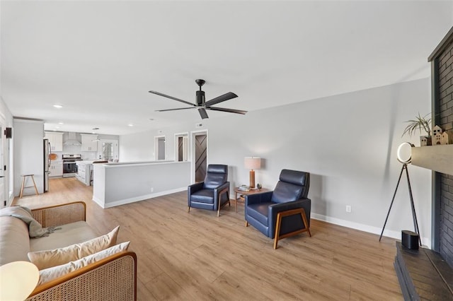 527 W Lake Dr, Edwardsville, IL 62025 - living area with light wood-style flooring, recessed lighting, ceiling fan, and baseboards