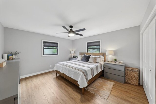 527 W Lake Dr, Edwardsville, IL 62025 - bedroom featuring light wood-type flooring, baseboards, and a ceiling fan