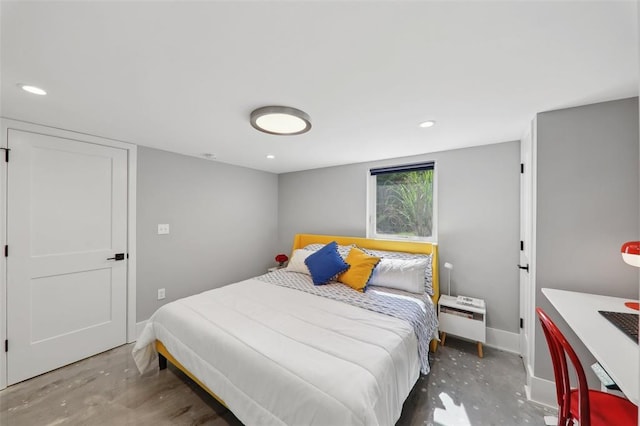 527 W Lake Dr, Edwardsville, IL 62025 - bedroom with recessed lighting and concrete flooring