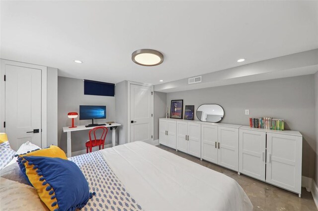 527 W Lake Dr, Edwardsville, IL 62025 - bedroom with concrete floors and recessed lighting