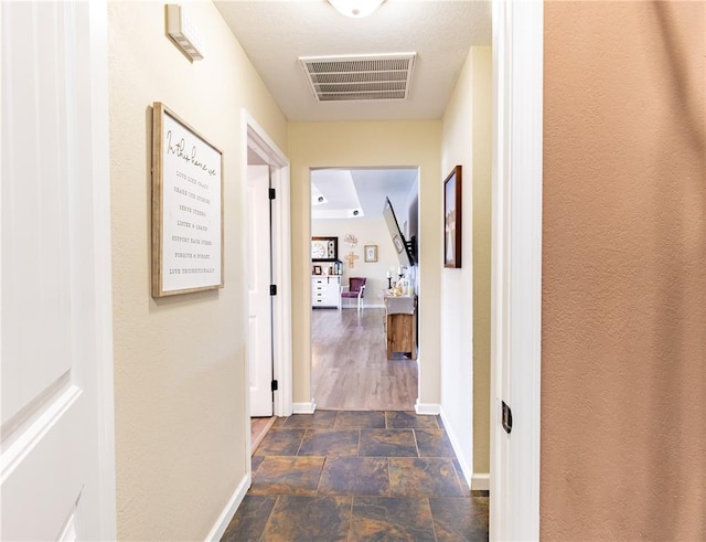 1114 Daffodil St, Sikeston, MO 63801 - hall with stone finish floors and baseboards