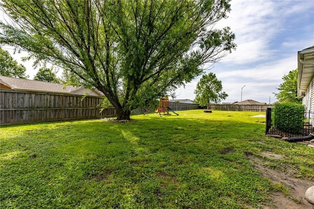 1114 Daffodil St, Sikeston, MO 63801 - view of yard with a playground
