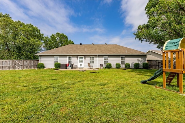 1114 Daffodil St, Sikeston, MO 63801 - back of house with a patio area and a playground