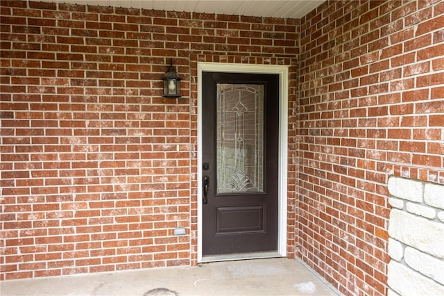 924 Brookside Ln, Rolla, MO 65401 - view of exterior entry featuring brick siding