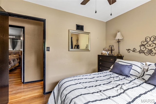5 Heathwood Ln, Fenton, MO 63026 - bedroom with light wood-style flooring and ceiling fan