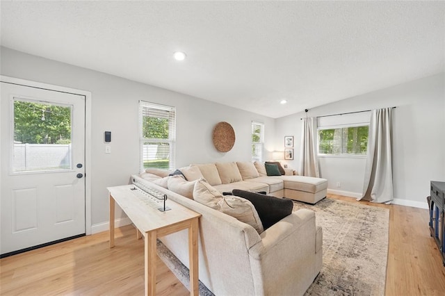 636 Parker Dr, Ballwin, MO 63021 - living area featuring plenty of natural light, light wood-style floors, recessed lighting, and baseboards