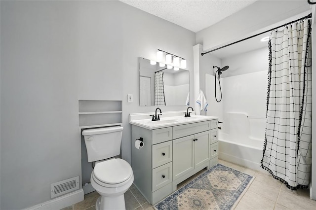 636 Parker Dr, Ballwin, MO 63021 - full bath with toilet, tile patterned floors, shower / bath combination with curtain, a textured ceiling, and vanity
