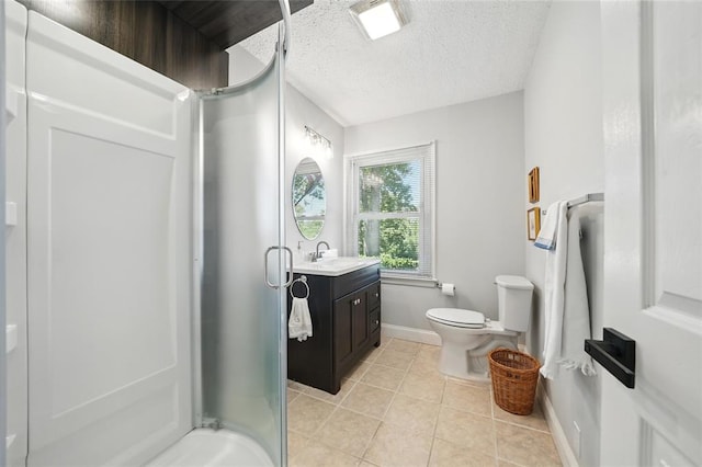 636 Parker Dr, Ballwin, MO 63021 - bathroom featuring a shower stall, tile patterned flooring, vanity, toilet, and a textured ceiling