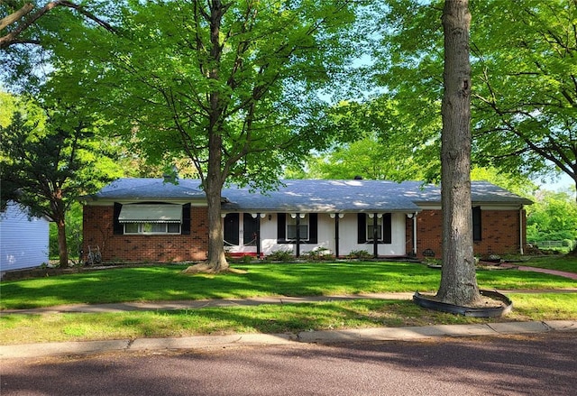 12837 Merribrook Dr, Florissant, MO 63033 - ranch-style house with brick siding and a front yard