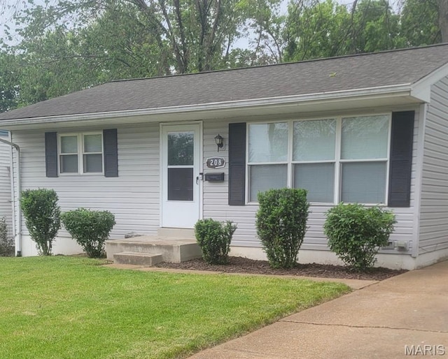 208 Floralea Pl, Saint Louis, MO 63127 - view of front of property with a front lawn and roof with shingles
