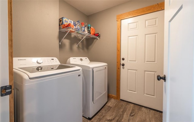 20998 Halifax Dr, Saint Robert, MO 65584 - laundry room featuring separate washer and dryer and wood finished floors