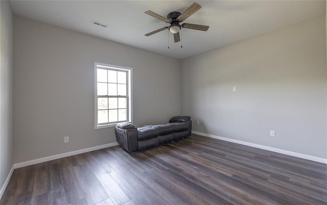 20998 Halifax Dr, Saint Robert, MO 65584 - unfurnished room with dark wood-style flooring, baseboards, and ceiling fan