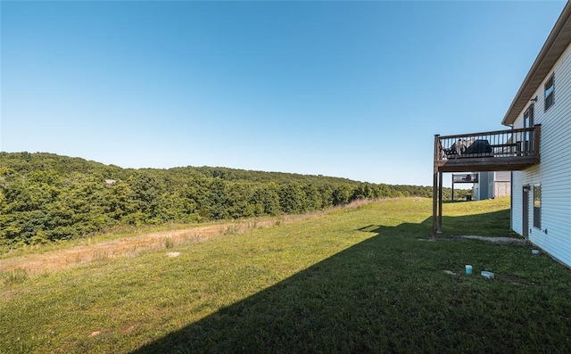 20998 Halifax Dr, Saint Robert, MO 65584 - view of green lawn featuring a wooden deck