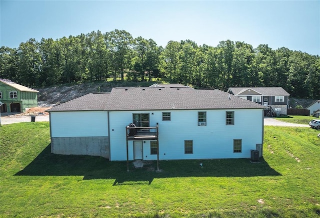 20998 Halifax Dr, Saint Robert, MO 65584 - rear view of property with a yard, cooling unit, and a deck