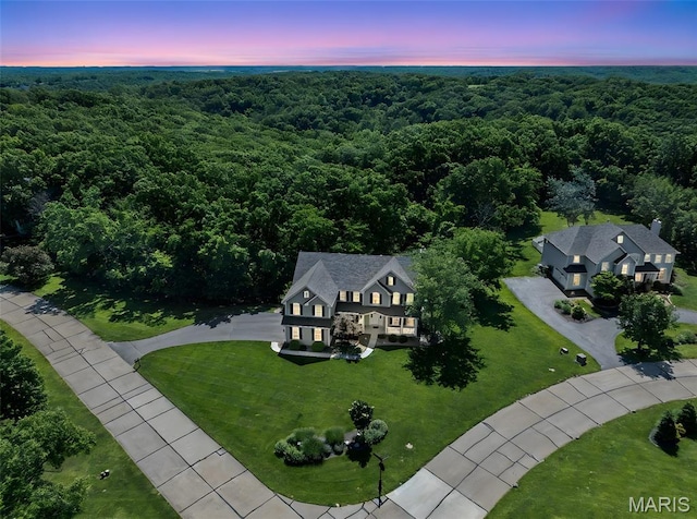 943 Sheffield Forest Ct, Saint Louis, MO 63021 - view of subject property with a heavily wooded area