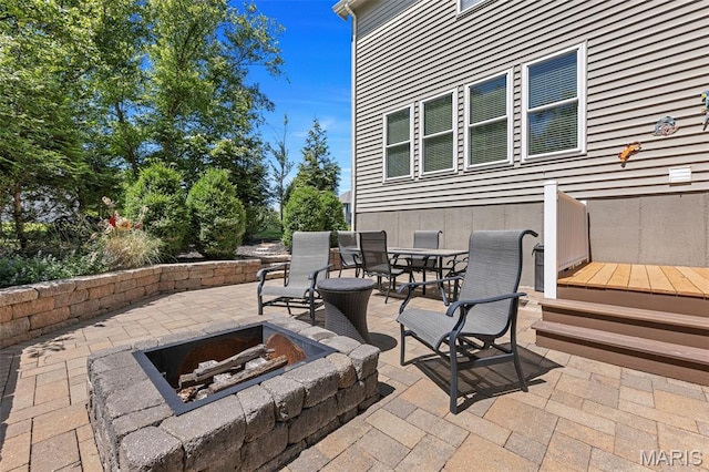 943 Sheffield Forest Ct, Saint Louis, MO 63021 - view of patio / terrace with a fire pit and outdoor dining space