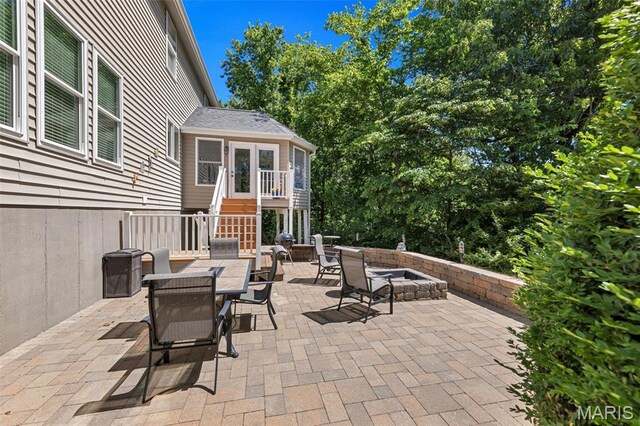 943 Sheffield Forest Ct, Saint Louis, MO 63021 - view of patio / terrace featuring an outdoor fire pit, stairs, and outdoor dining area