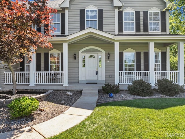 943 Sheffield Forest Ct, Saint Louis, MO 63021 - view of front of property with covered porch and a front lawn