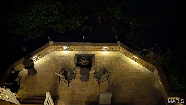 943 Sheffield Forest Ct, Saint Louis, MO 63021 - patio at night featuring a patio