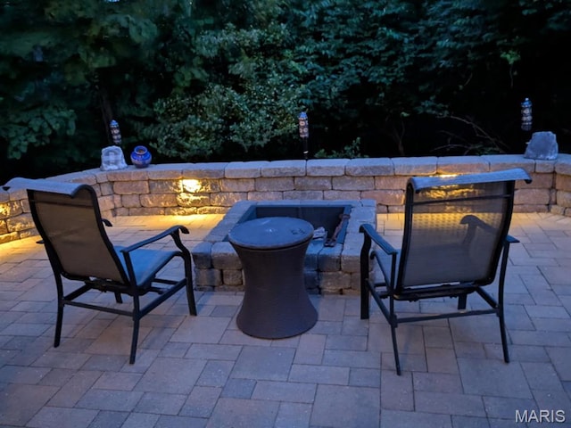943 Sheffield Forest Ct, Saint Louis, MO 63021 - view of patio / terrace with a fire pit