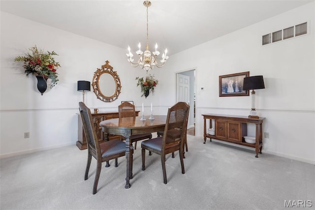 943 Sheffield Forest Ct, Saint Louis, MO 63021 - dining area with a chandelier and light colored carpet