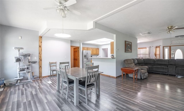 12755 Echo Ln, Plato, MO 65552 - dining area with a ceiling fan, wood finished floors, and baseboards