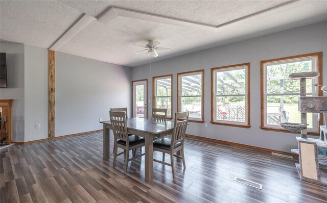 12755 Echo Ln, Plato, MO 65552 - dining space with a textured ceiling, ceiling fan, dark wood-style flooring, and baseboards