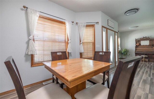 12755 Echo Ln, Plato, MO 65552 - dining room with wood finished floors and baseboards