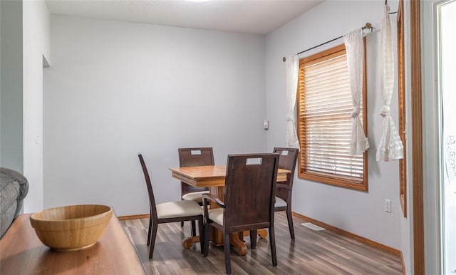 12755 Echo Ln, Plato, MO 65552 - dining area with wood finished floors and baseboards