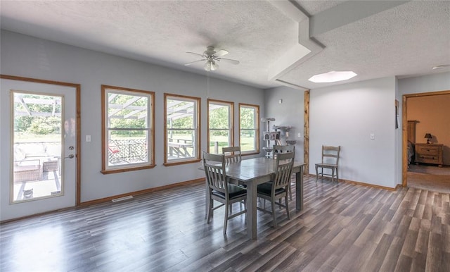 12755 Echo Ln, Plato, MO 65552 - dining space featuring a textured ceiling, baseboards, ceiling fan, and wood finished floors