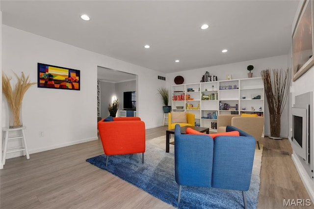 16027 Clarkson Woods Dr, Chesterfield, MO 63017 - living room featuring light wood-style floors and recessed lighting