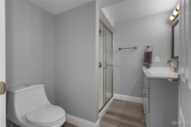 16027 Clarkson Woods Dr, Chesterfield, MO 63017 - full bath with vanity, a stall shower, and wood finished floors