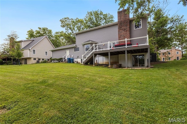 16027 Clarkson Woods Dr, Chesterfield, MO 63017 - rear view of property with a deck, stairs, a chimney, and a yard