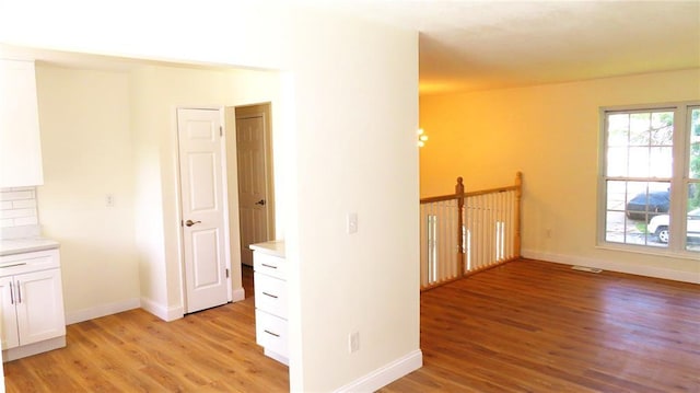 3213 Yvette Ct, Florissant, MO 63031 - empty room featuring light wood finished floors and baseboards