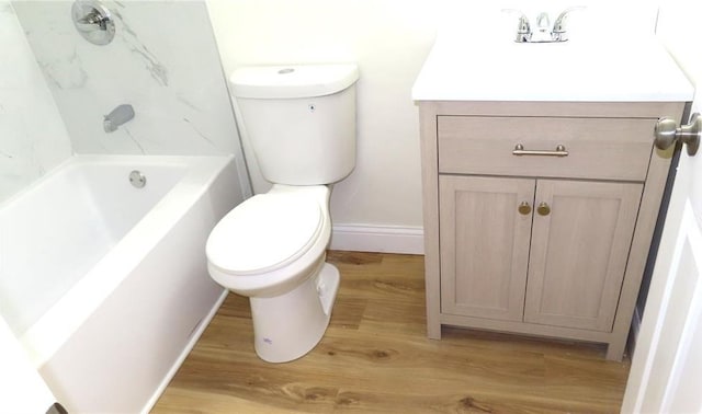 3213 Yvette Ct, Florissant, MO 63031 - full bathroom featuring toilet, wood finished floors, vanity, and baseboards