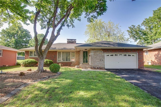 3406 Mcarthur Blvd, Alton, IL 62002 - ranch-style home featuring asphalt driveway, a chimney, a front lawn, a garage, and brick siding