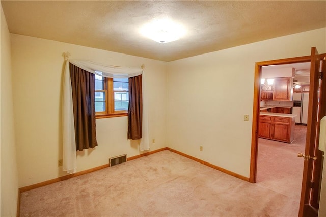 3406 Mcarthur Blvd, Alton, IL 62002 - spare room with light colored carpet and baseboards