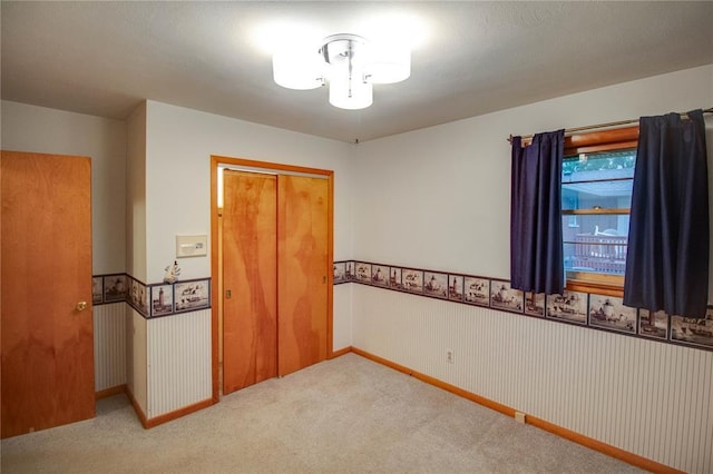 3406 Mcarthur Blvd, Alton, IL 62002 - carpeted spare room with wainscoting and baseboards