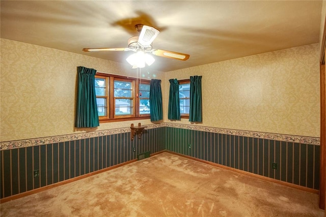 3406 Mcarthur Blvd, Alton, IL 62002 - unfurnished room featuring ceiling fan, a wainscoted wall, and carpet