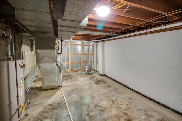 3406 Mcarthur Blvd, Alton, IL 62002 - unfinished basement featuring gas water heater and heating unit