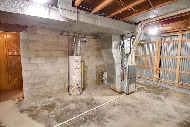 3406 Mcarthur Blvd, Alton, IL 62002 - unfinished below grade area with water heater, heating unit, and concrete block wall