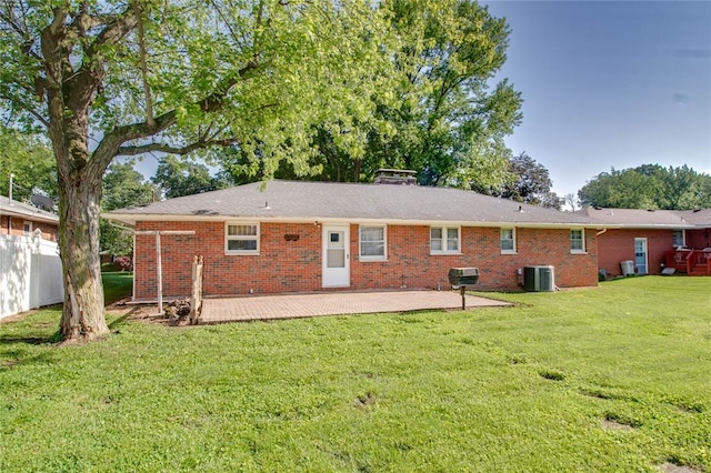 3406 Mcarthur Blvd, Alton, IL 62002 - back of property featuring a patio area, central AC, brick siding, and a lawn
