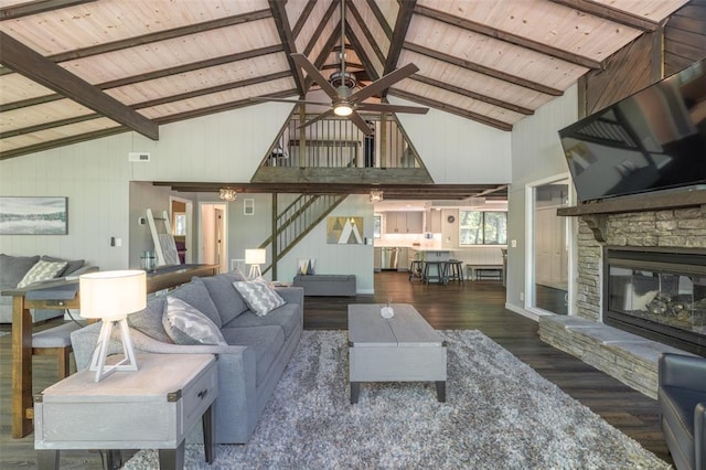 600 Innisfree Lake Dr, Innsbrook, MO 63390 - living area featuring stairway, high vaulted ceiling, wood finished floors, ceiling fan, and a fireplace