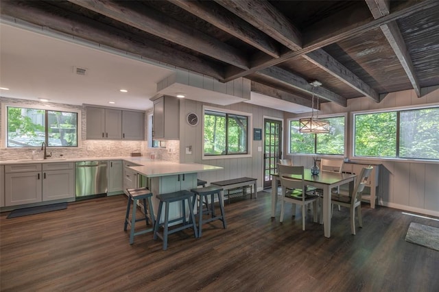 600 Innisfree Lake Dr, Innsbrook, MO 63390 - dining space featuring dark wood finished floors, beamed ceiling, baseboards, and recessed lighting