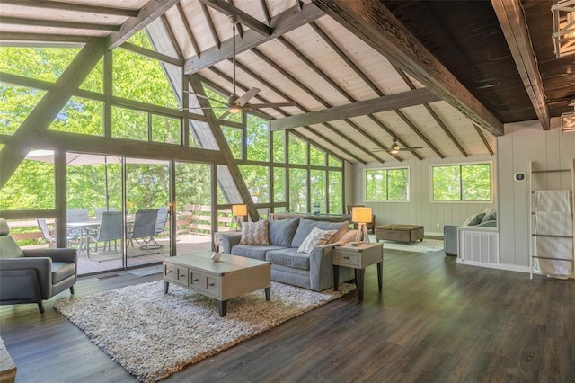 600 Innisfree Lake Dr, Innsbrook, MO 63390 - living area featuring high vaulted ceiling, a ceiling fan, healthy amount of natural light, beamed ceiling, and wood finished floors