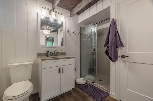 600 Innisfree Lake Dr, Innsbrook, MO 63390 - bathroom featuring a stall shower, vanity, toilet, wood finished floors, and beamed ceiling