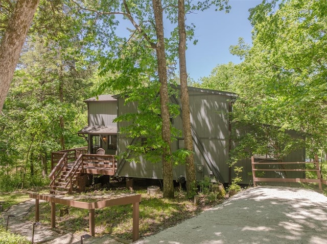 600 Innisfree Lake Dr, Innsbrook, MO 63390 - view of home's exterior with a deck